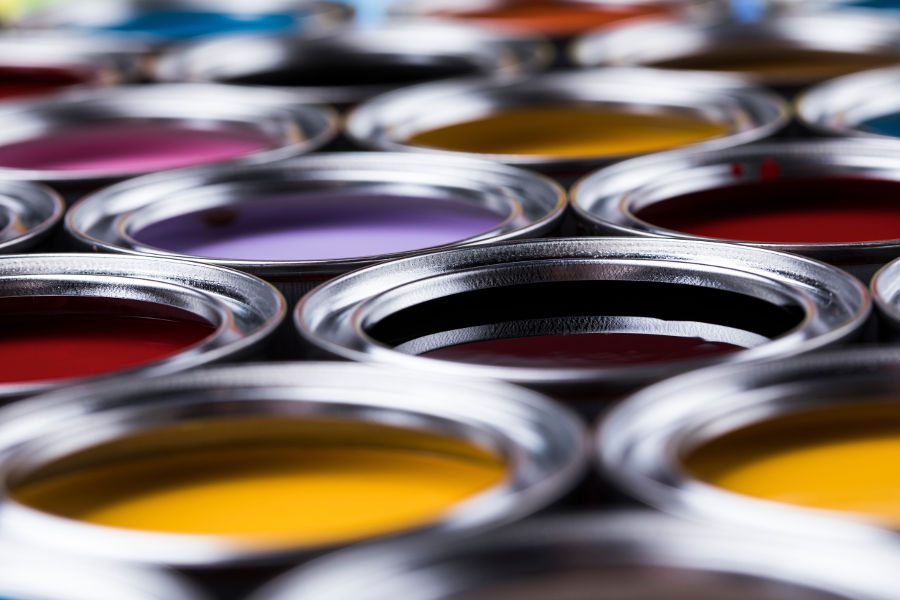 Group of tin metal cans with color paint