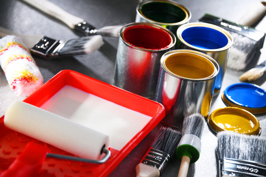 Paint cans and paint brushes